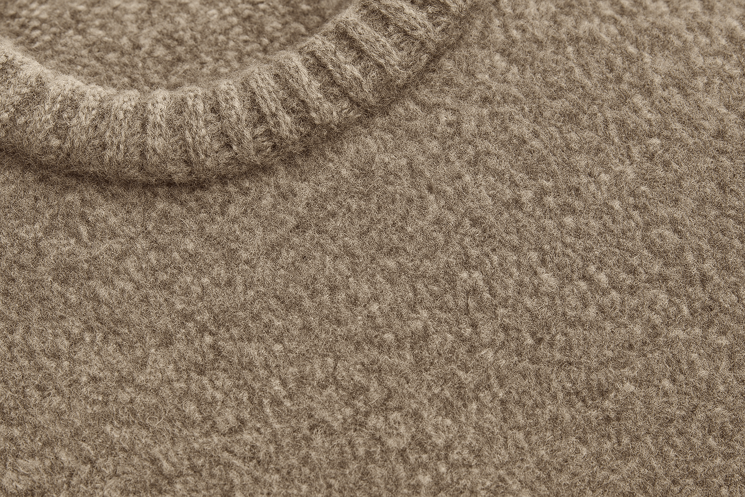 A close-up of a shrunken merino wool sweater's texture